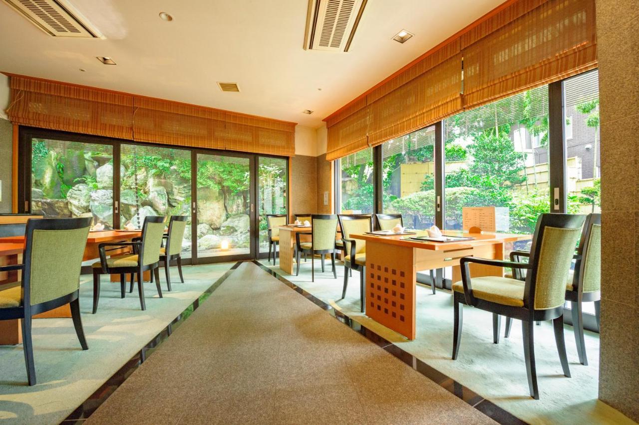 Kanazawa Hakuchoro Hotel Sanraku -Natural Hot Spring- Exterior foto Interior of a restaurant in Tokyo